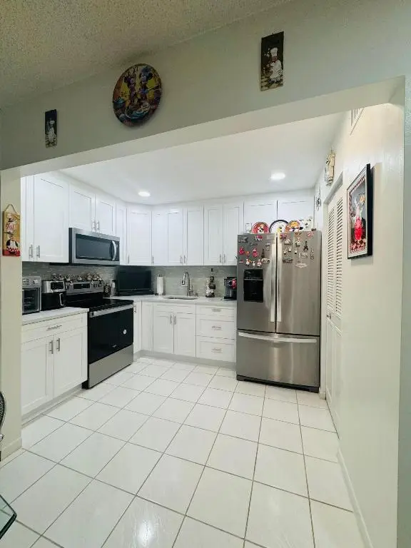 3560 Pine Tree Court #D-2, Greenacres, FL 33463 - Image #2