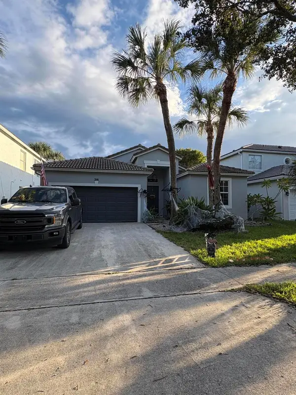 216 Seminole Lakes Drive, Royal Palm Beach, FL 33411
