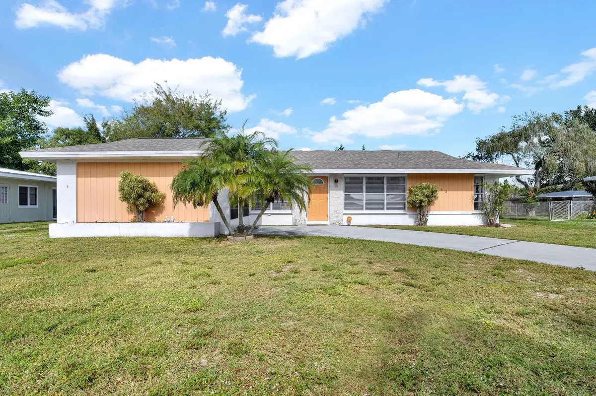 153 NE Tunison Avenue, Port Saint Lucie, FL 34983 - Image #1