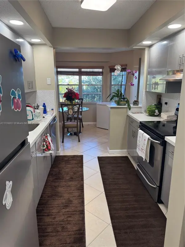 12650 SW 6th St #411K, Pembroke Pines, FL 33027