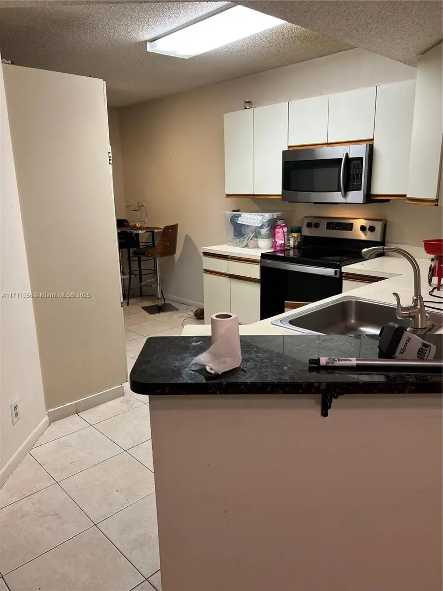 8871 Wiles Rd #208, Coral Springs, FL 33067 - Image #2