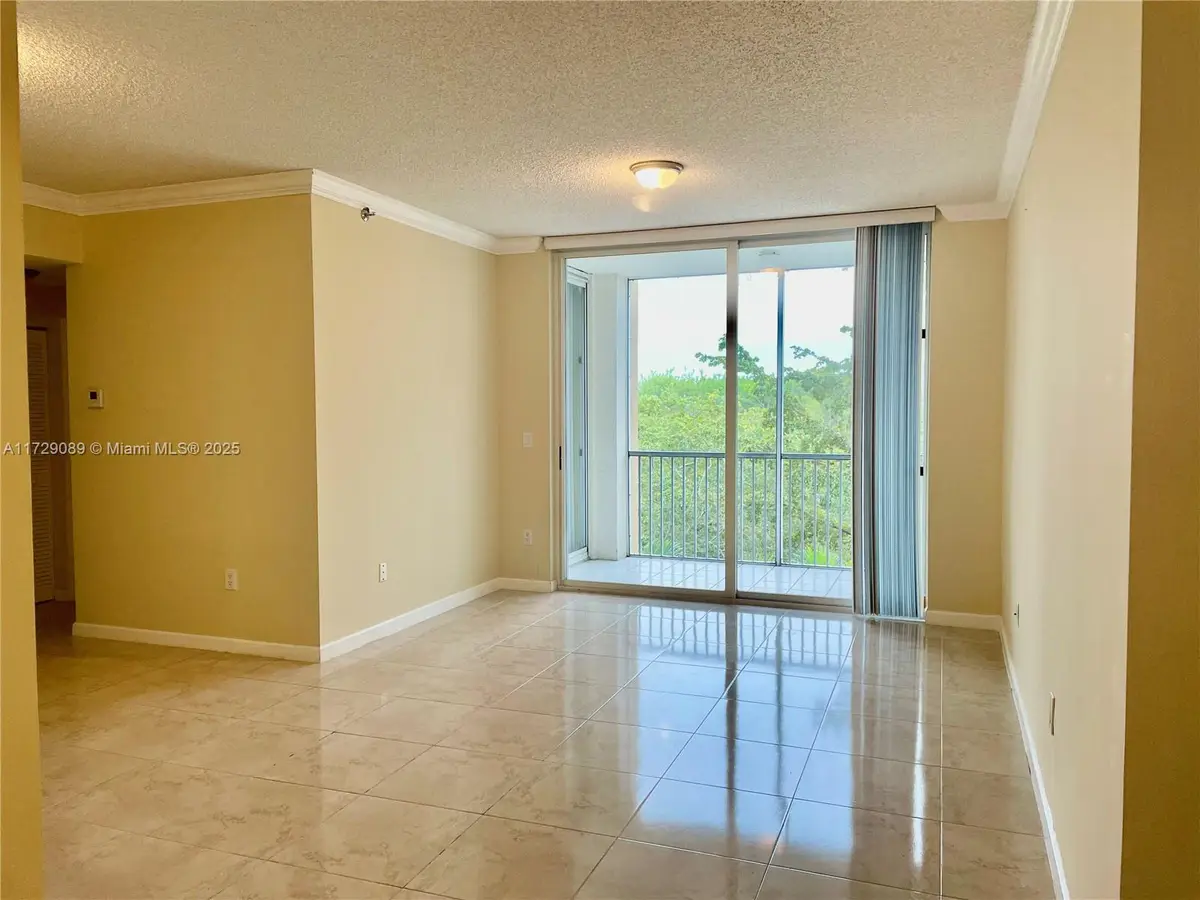 9805 NW 52nd St #411, Doral, FL 33178 - Image #1