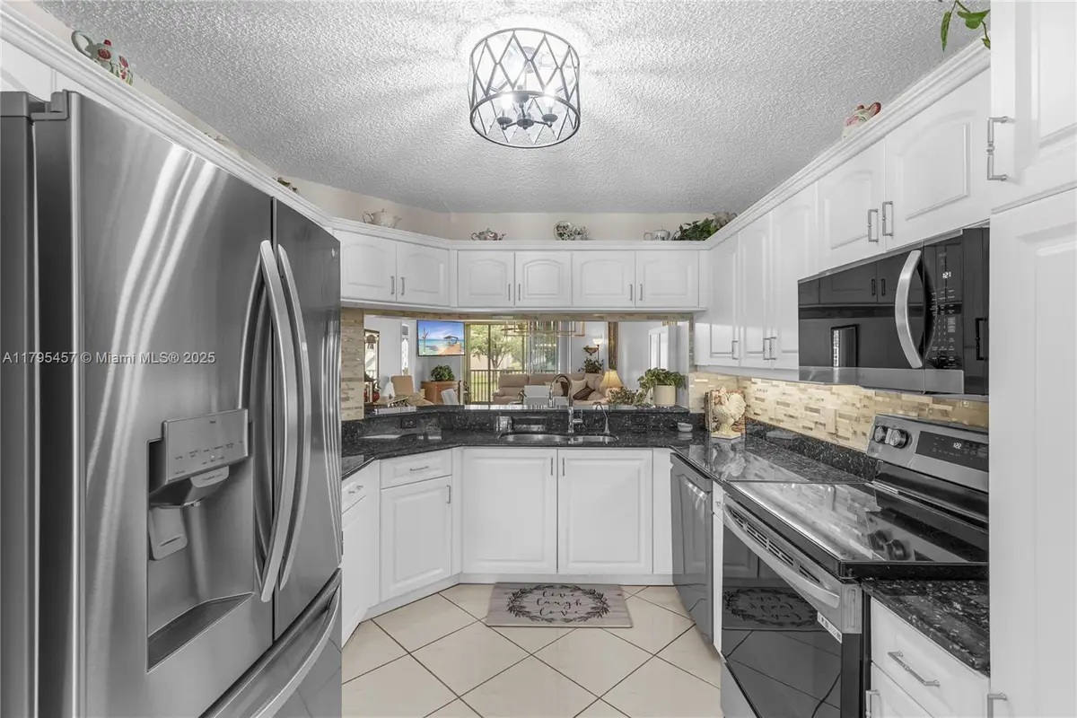 2541 N Nob Hill Rd #205, Sunrise, FL 33322 - #1