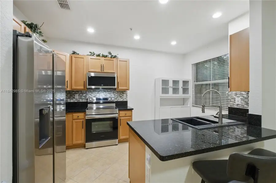 2851 W Prospect Rd #307, Tamarac, FL 33309 - Image #2