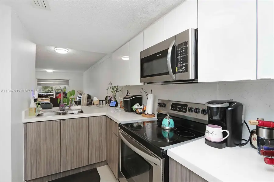 9917 W Okeechobee Rd #3-303, Hialeah Gardens, FL 33016 - Image #2