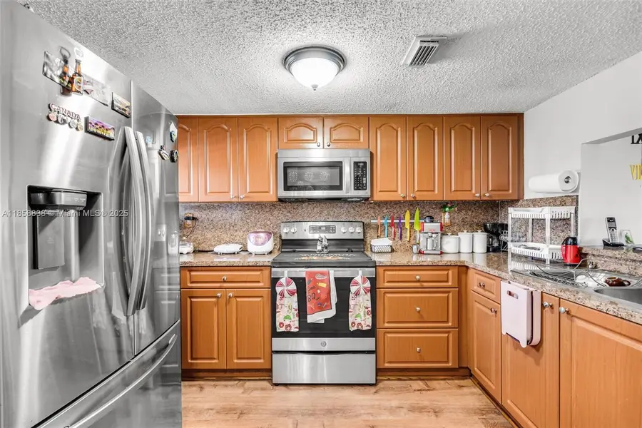 9917 W Okeechobee Rd #3-201, Hialeah Gardens, FL 33016 - Image #3