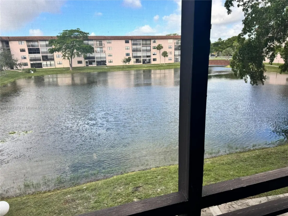 4960 E Sabal Palm Blvd #203, Tamarac, FL 33319 - Image #1