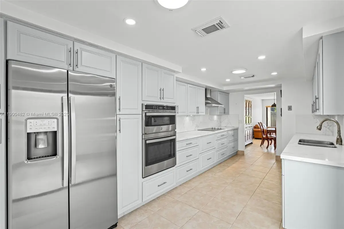 19435 E Lake Dr, Country Club, FL 33015 - Image #1