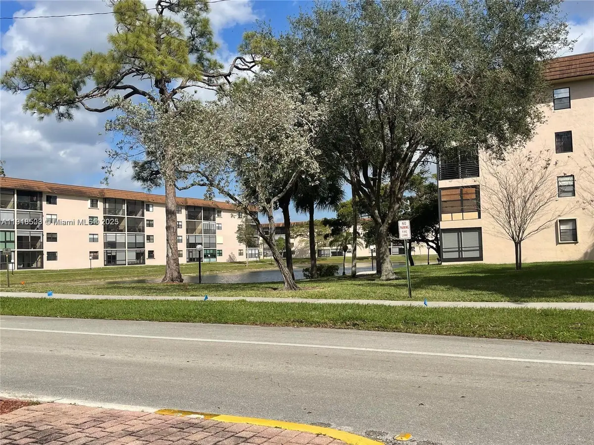 4940 E Sabal Palm Blvd #302, Tamarac, FL 33319 - Image #1