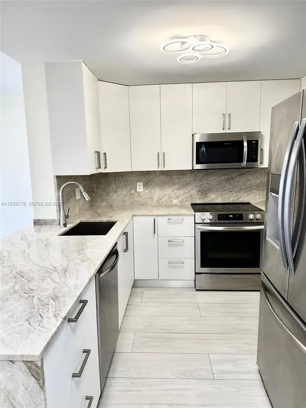 401 Golden Isles Dr #701, Hallandale Beach, FL 33009