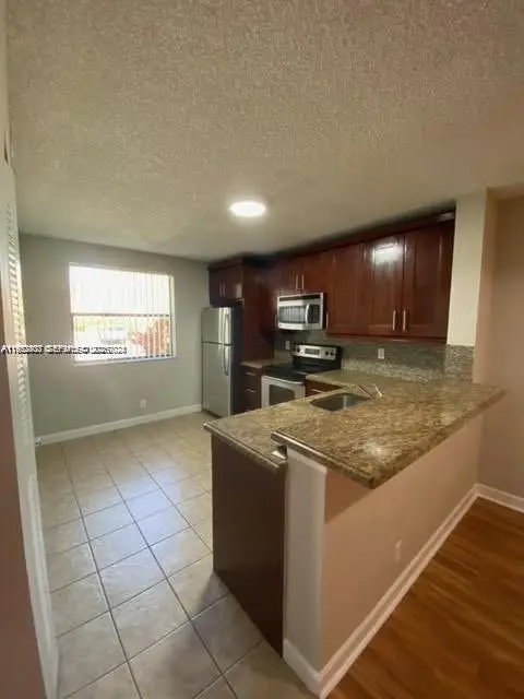 5841 Riverside Dr #106A3, Coral Springs, FL 33067 - Image #2