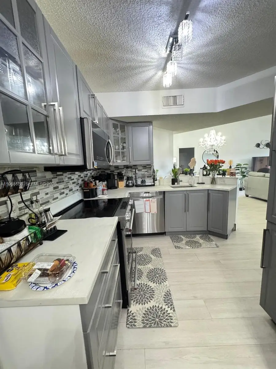 8801 Wiles Rd #308, Coral Springs, FL 33067 - Image #2