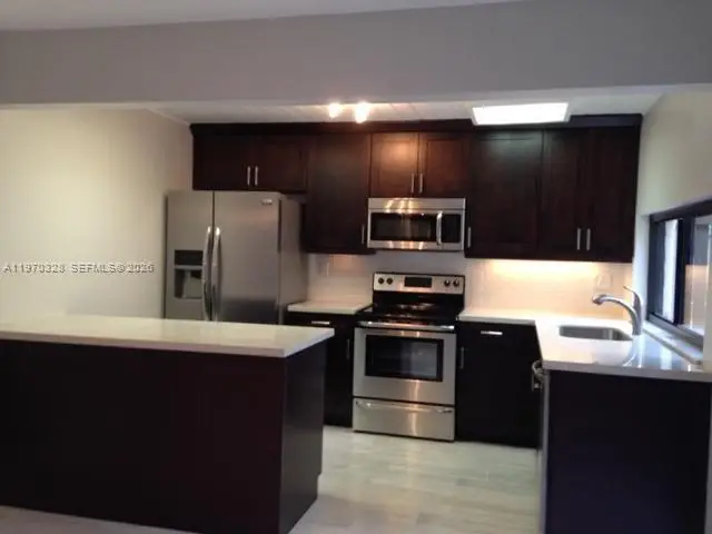 4724 SW 67TH AVE. MIAMI, Sw 67th Ave #E10, Miami, FL 33155 - #3