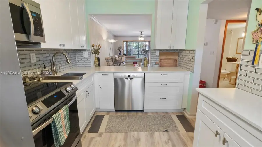 8605 W Sample Rd #202, Coral Springs, FL 33065 - #2