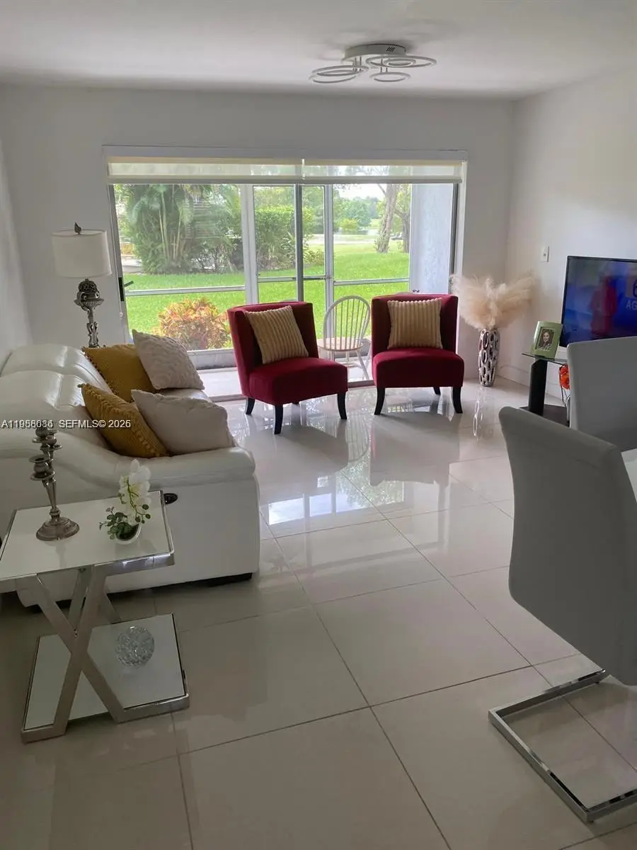 8838 W Mcnab Rd #104, Tamarac, FL 33321 - #1