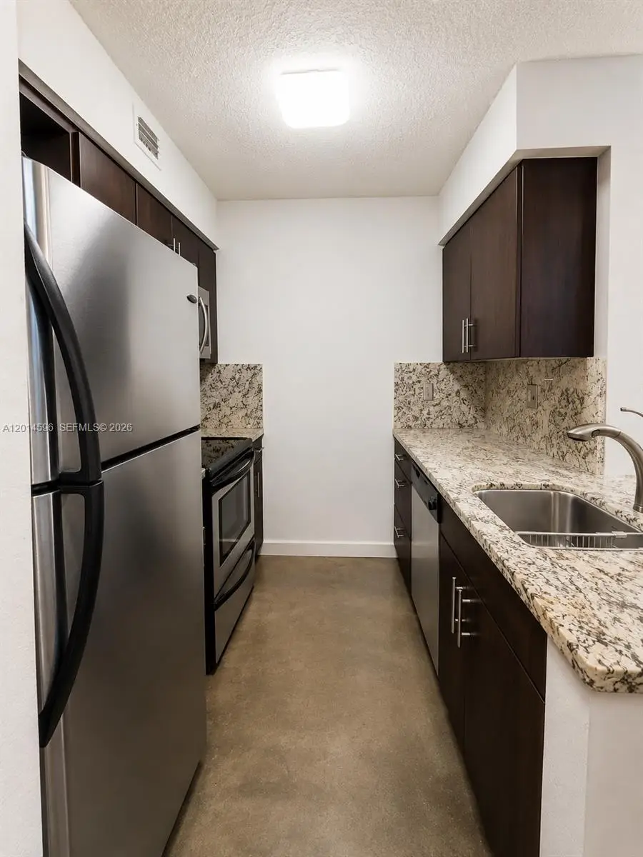 2890 N Oakland Forest Dr #203, Oakland Park, FL 33309 - #3