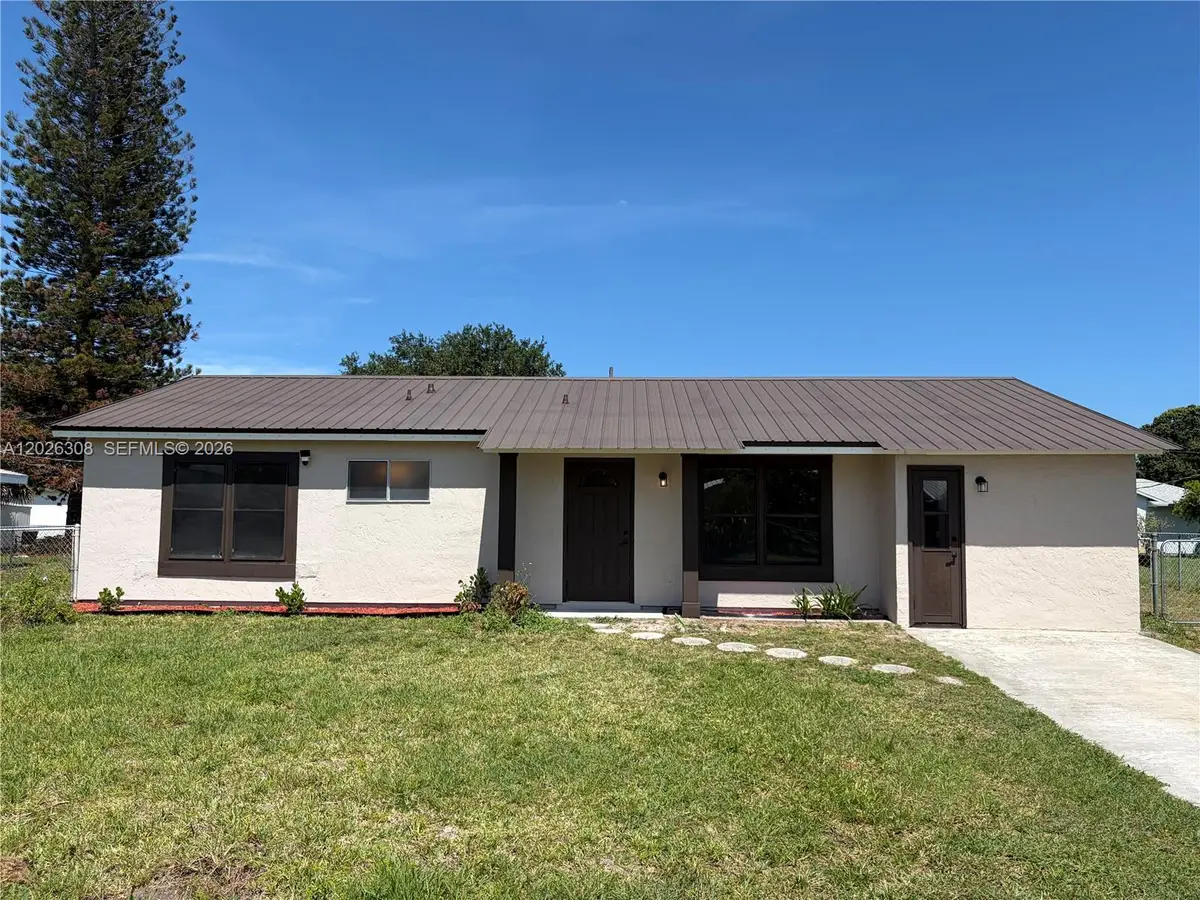 653 NE Atlas Avenue, Palm Bay, FL 32905 - #1