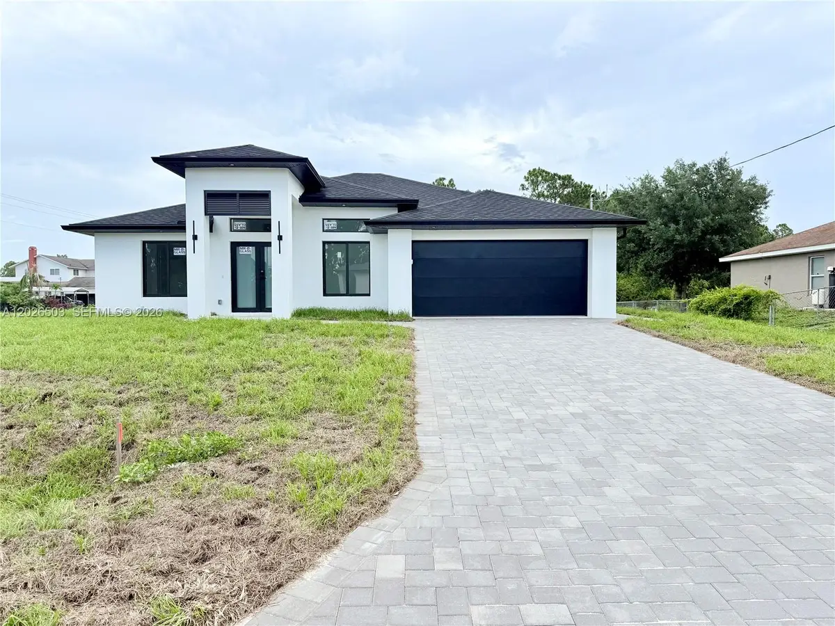 705 Colyer St E, Lehigh Acres, FL 33974 - #1