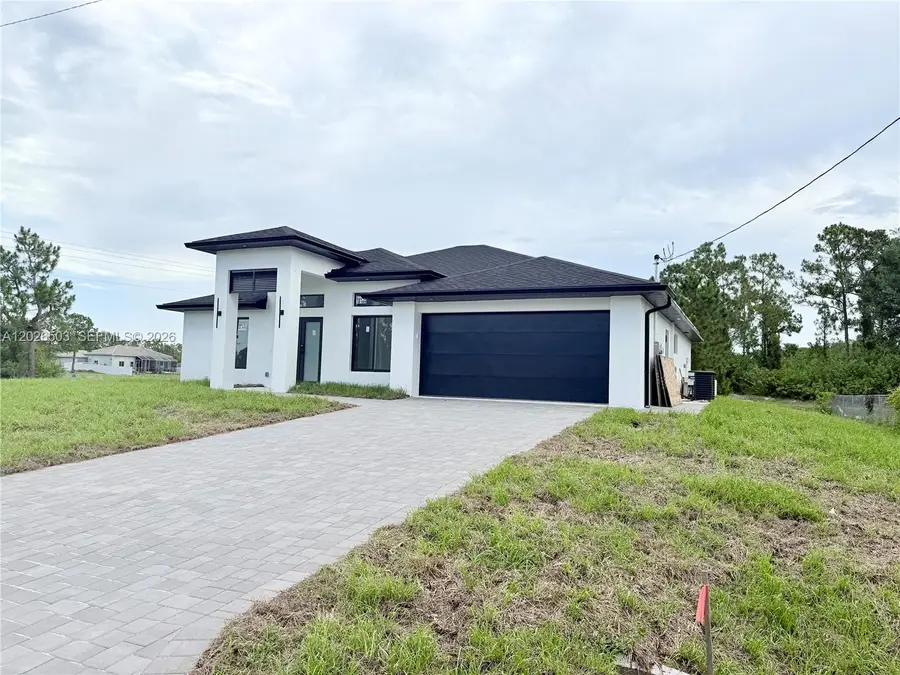 705 Colyer St E, Lehigh Acres, FL 33974 - #3