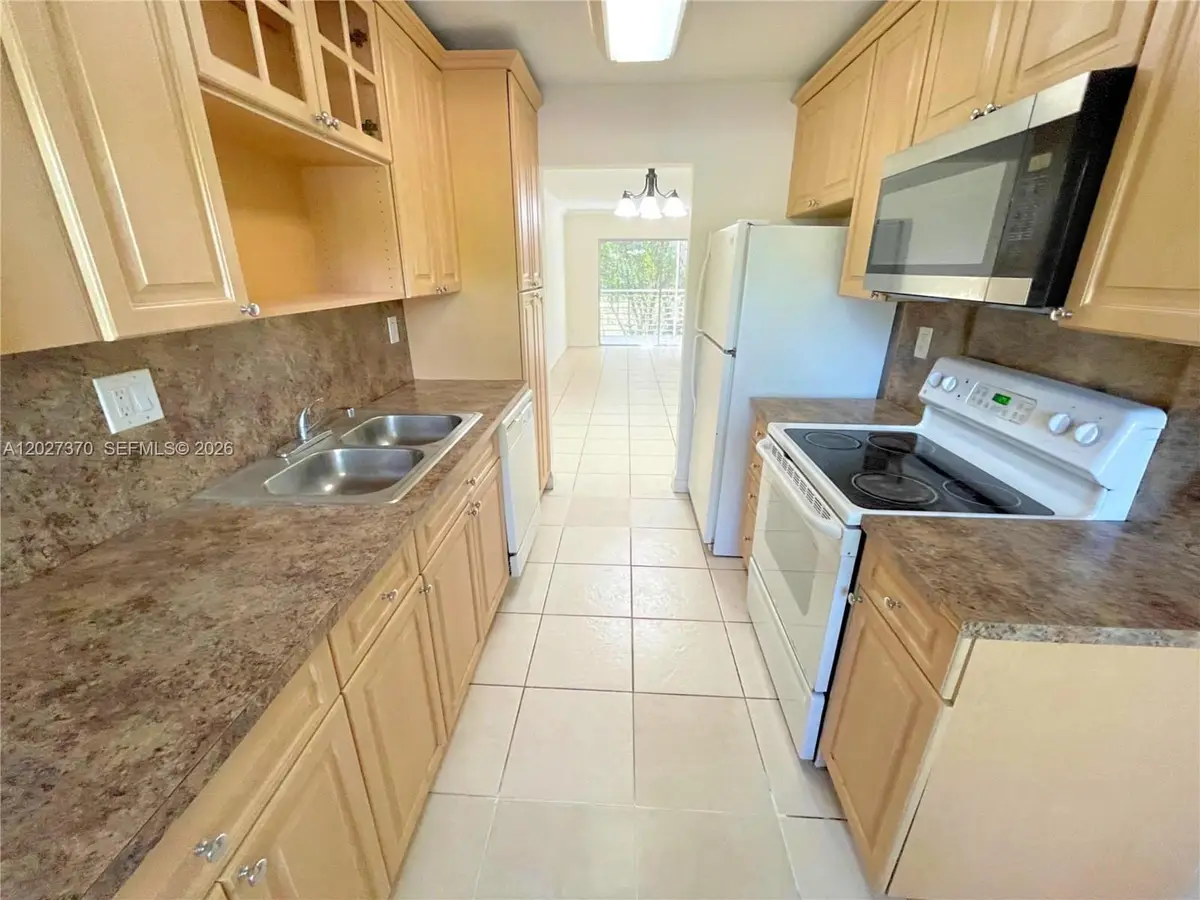8450 Lagos De Campo Blvd #206, Tamarac, FL 33321 - #1