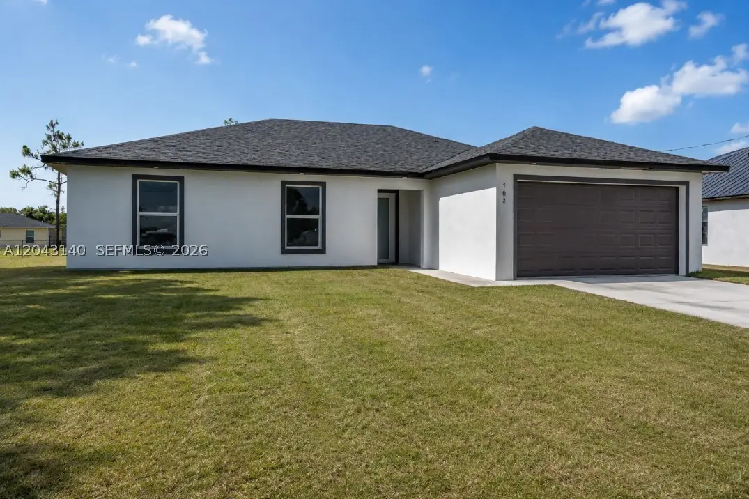 704 E Carbon, Lehigh Acres, FL 33974 - #1