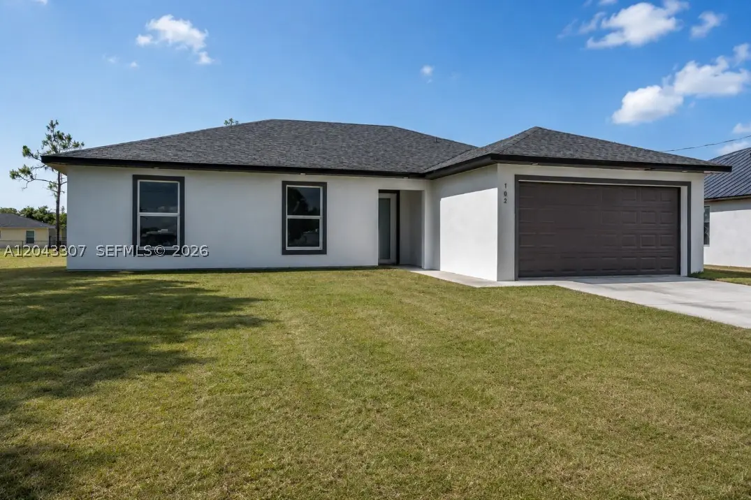 702 Carbon St, Lehigh Acres, FL 33974 - #1