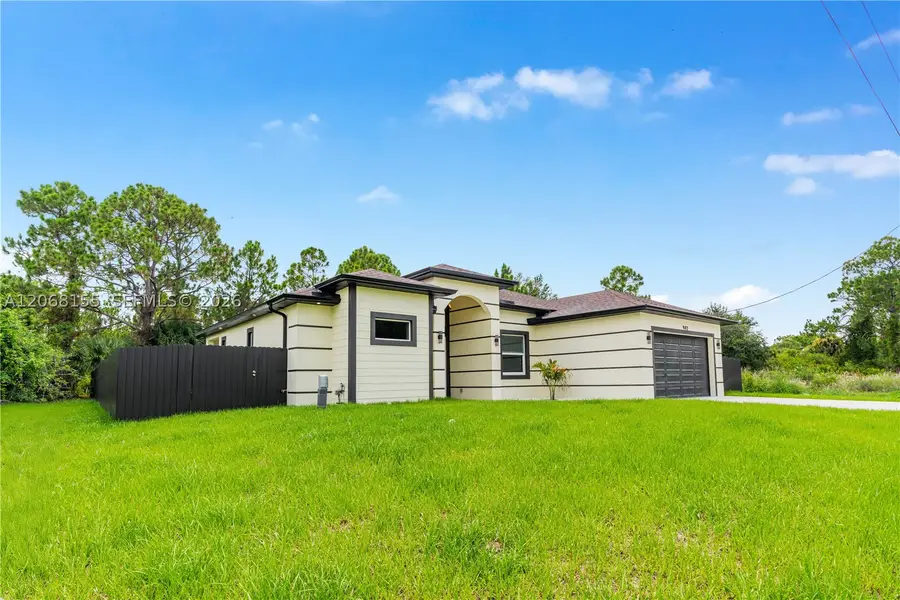 942 E Kanuga St, Lehigh Acres, FL 33974 - #3