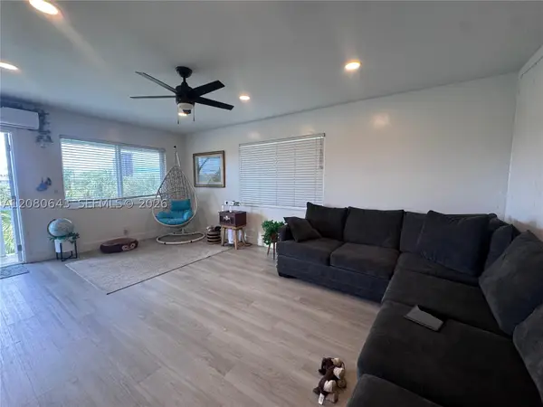 455 Golden Isles Dr #310, Hallandale Beach, FL 33009