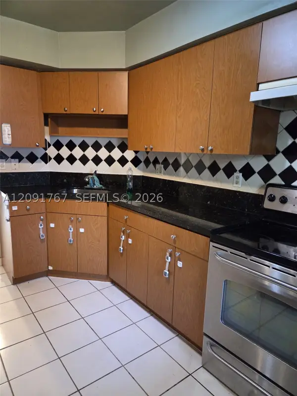 9101 W Sample Rd #102, Coral Springs, FL 33065