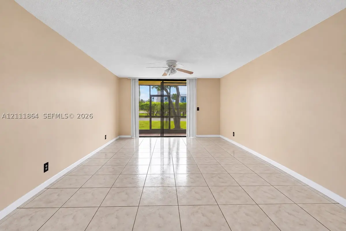 6195 Rock Island Rd #104, Tamarac, FL 33319 - #1