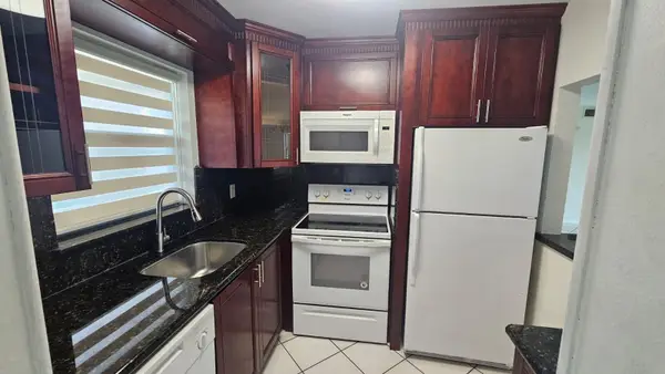 9911 Sandalfoot Boulevard #116, Boca Raton, FL 33428