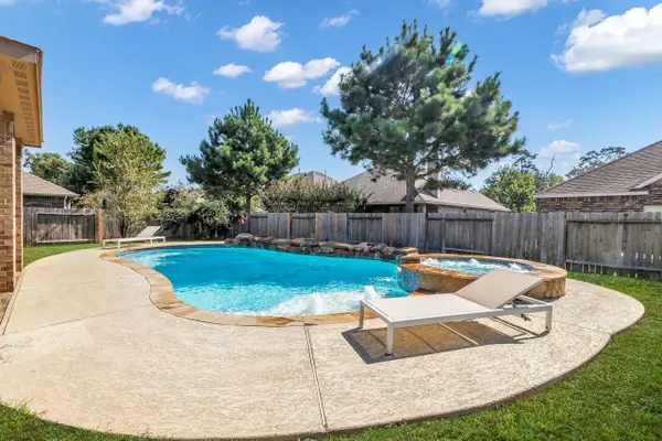 14206 Rainier Peak Crossing, Conroe, TX 77384