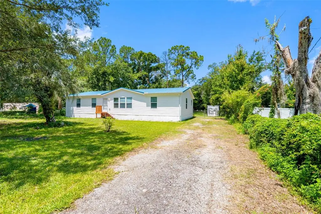 6847 Woodsman Drive, Wesley Chapel, FL 33544 - #1
