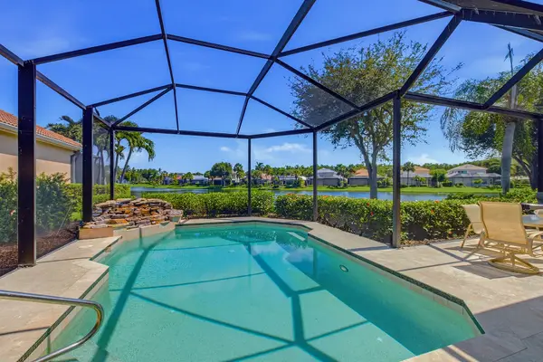 9097 Troon Lakes Drive, Naples, FL 34109