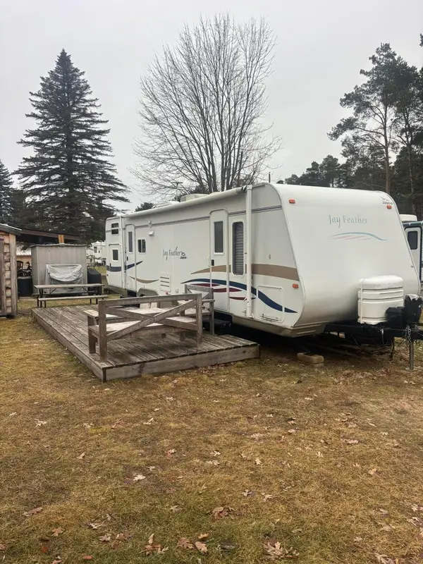 9806 Golf Port Drive N, Canadian Lakes, MI 49346