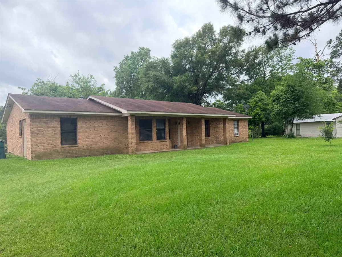 310 Holt St, Carthage, TX 75633 - #1